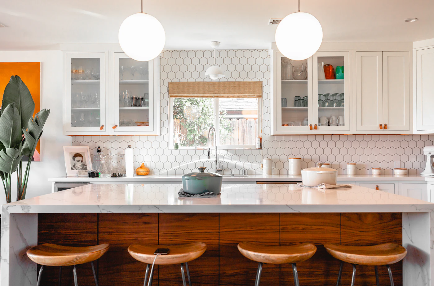 Renovated kitchen with timber cabinetry and stone island